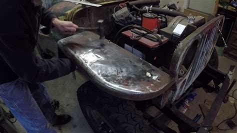 shrinking sheet metal with a torch|stretched sheet metal with propane torch.